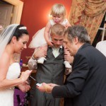 Bride and groom amazed by trick