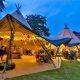 Beautiful wedding reception being held in a tipi.